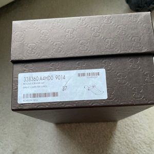 White and brown thong sandal